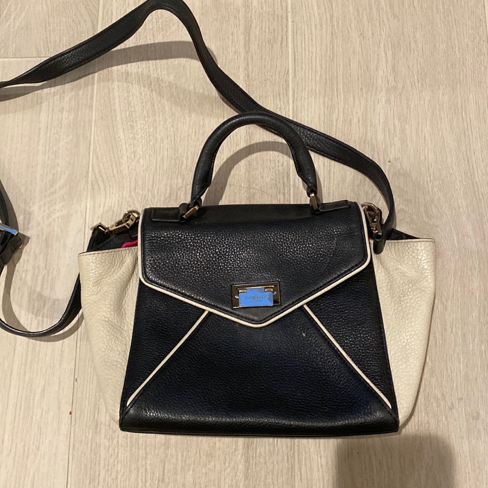 Black and white purse w pink interior from Kate Spade